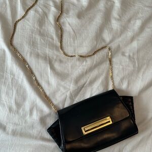 Zac Posen black Leather Crossbody Bag with Gold Chain.